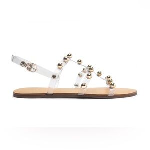 Schutz clear vinyl with gold embellishment